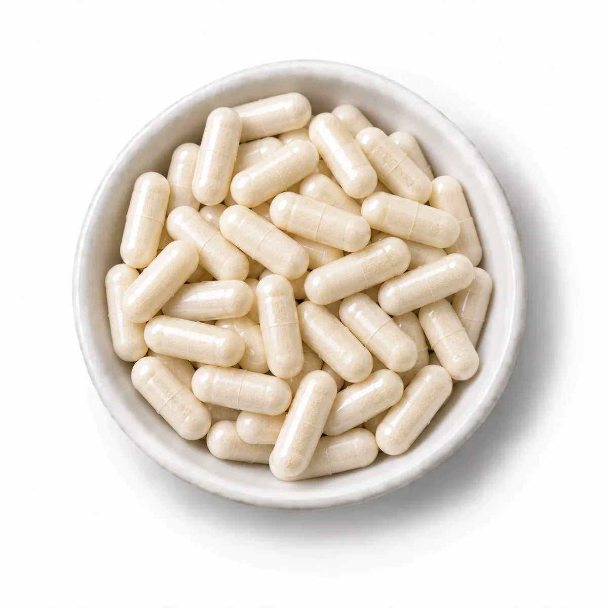 Organic Fenugreek Capsules in a white dish