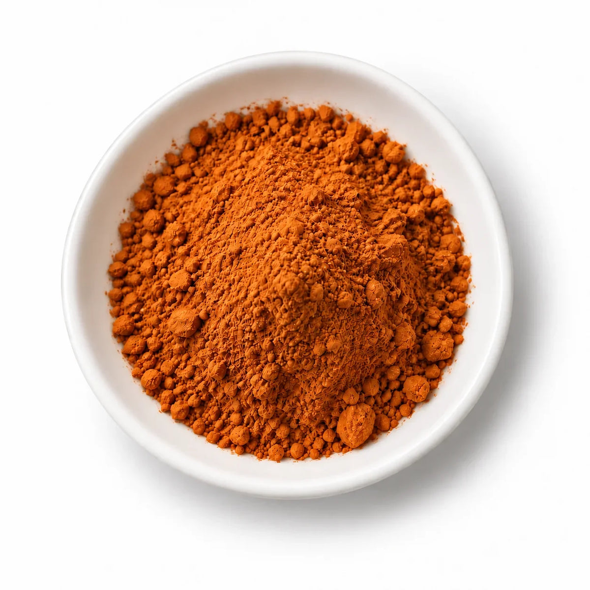 Organic Manjistha Powder in a white dish