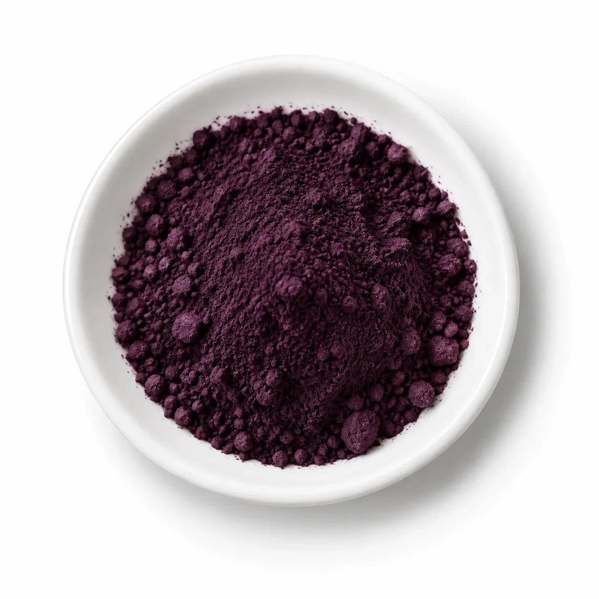 Organic Maqui Berry Powder in a white dish