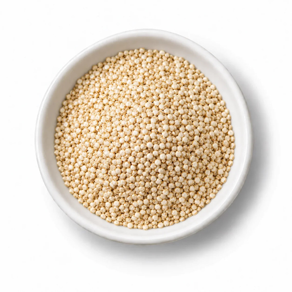Bio-Quinoa-Körner in einer weißen Schale